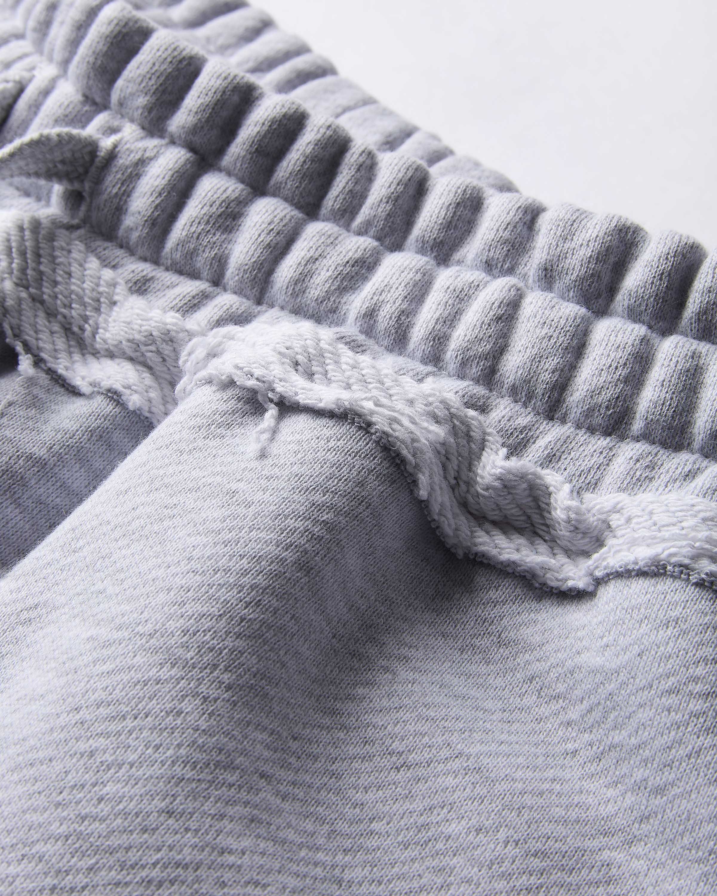 Close-up of textured gray fabric with a focus on texture and pattern.