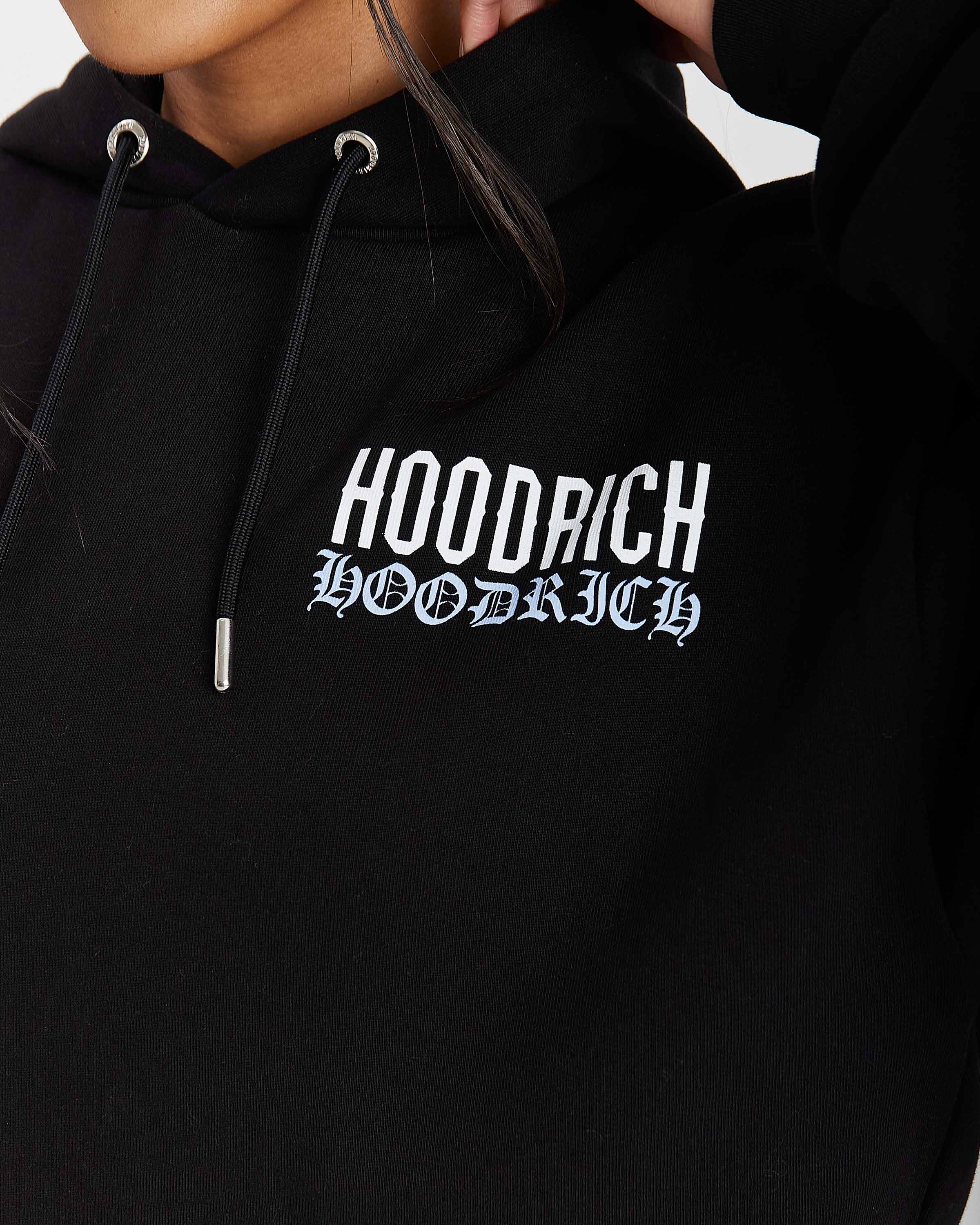 Black hoodie with 'HOODRICH' text on a plain background
