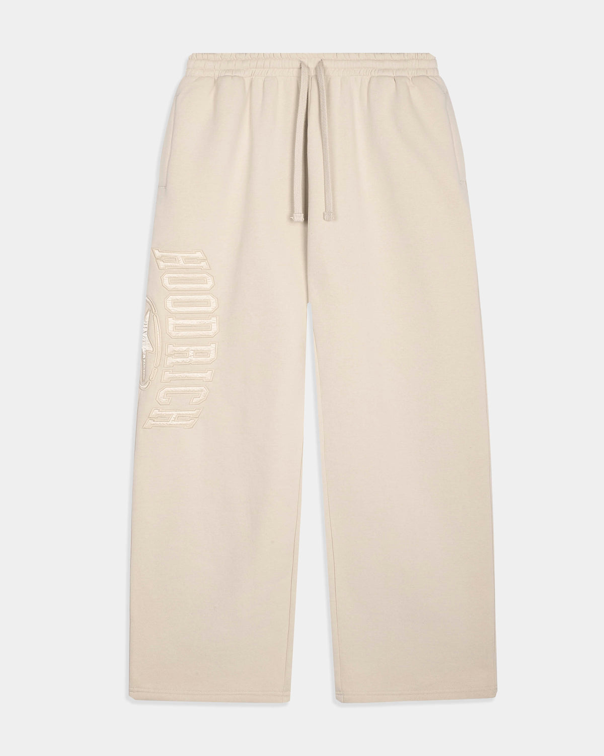 Cream-colored sweatpants with a drawstring waist and a tonal vertical 'HOODRICH' logo printed on the left leg, shown against a light gray background.