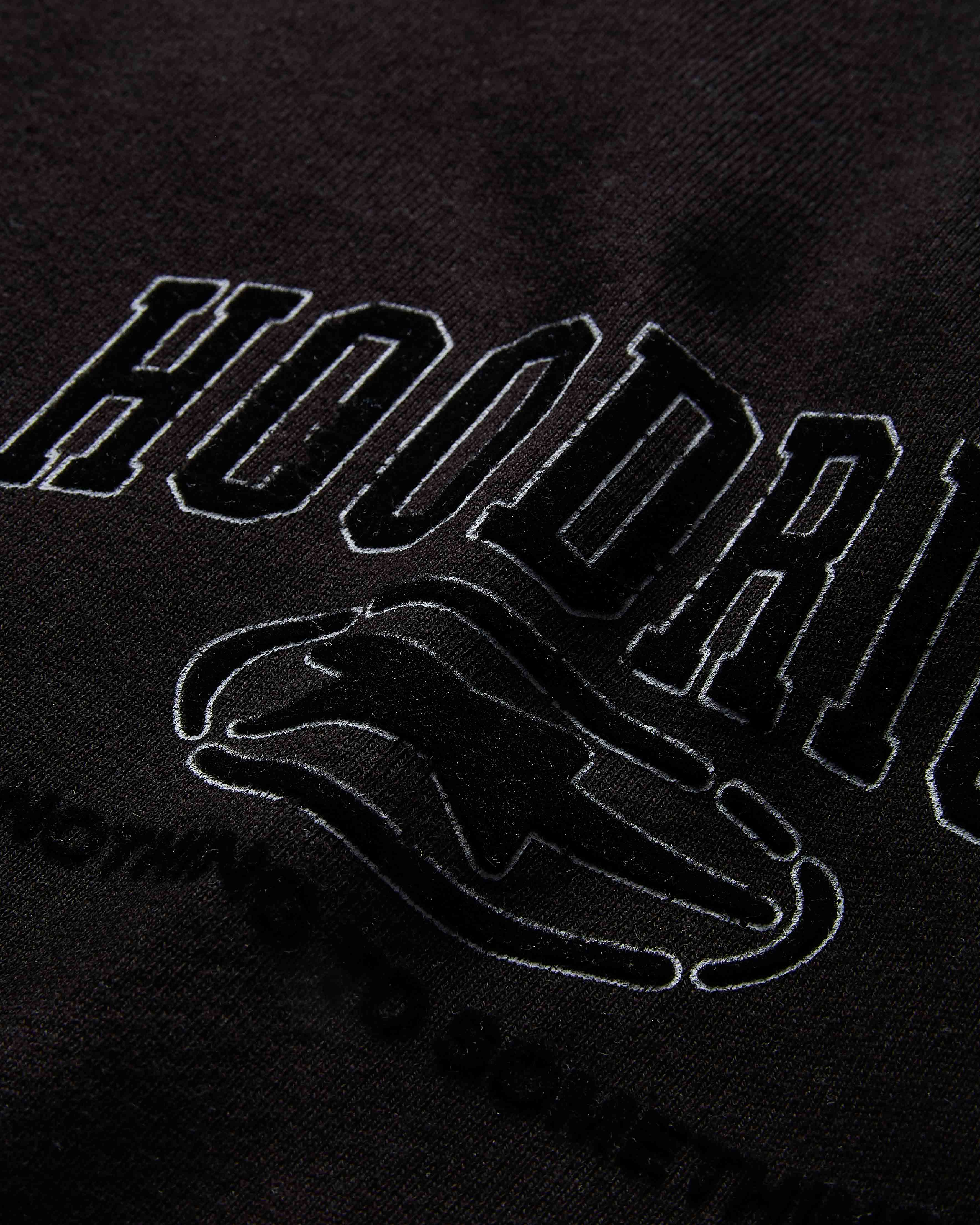 Black hoodie with 'Hoodrich' text and hand graphic on a black background