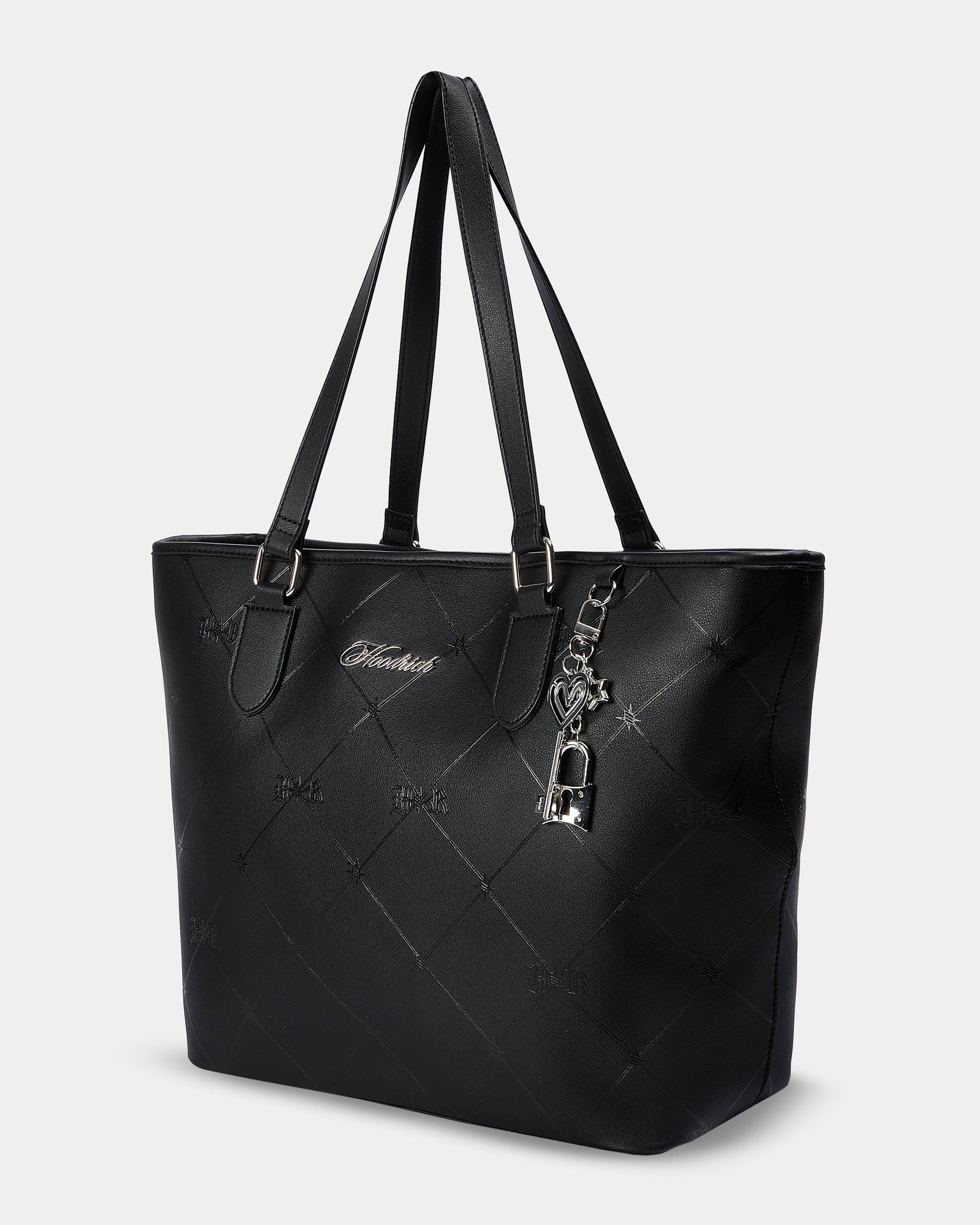 Black quilted handbag with a brand logo on a light gray background