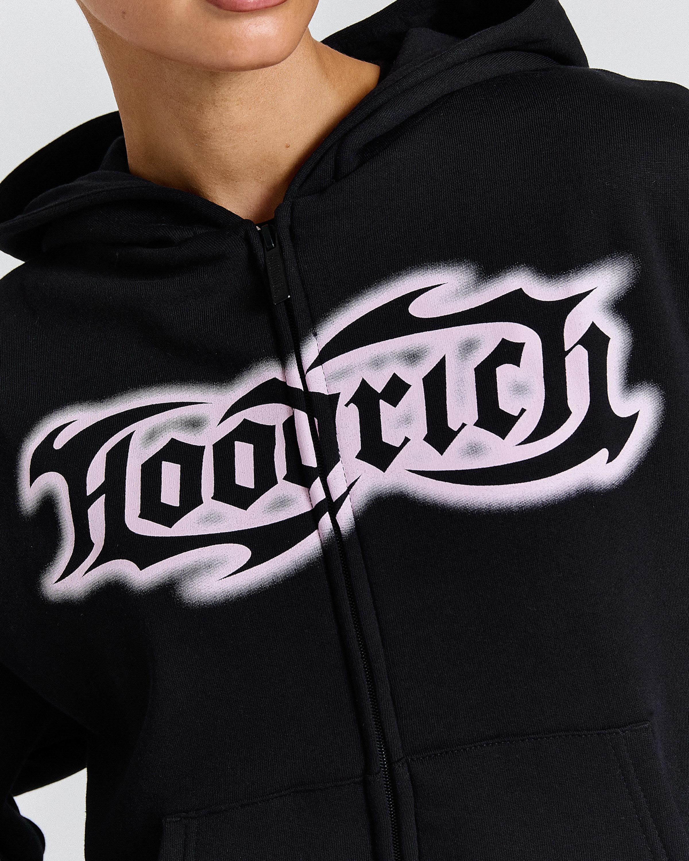 Black hoodie with white 'Hooded' text design on a plain background