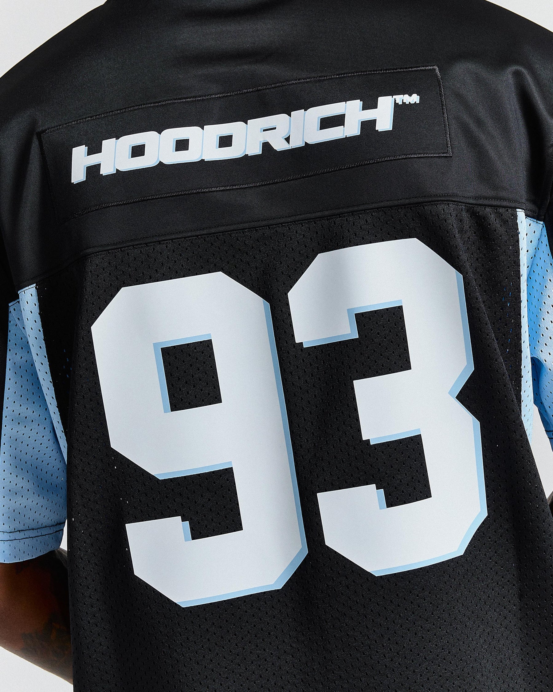 Black sports jersey with 'Hoodrich' branding and number '93'